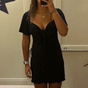 Black dress with a tie in the front from Loft, worn once